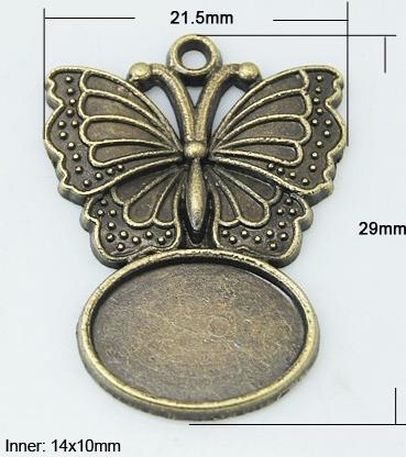 MEDALJON ANTIK BRON, 29X21.5 MM, METULJ